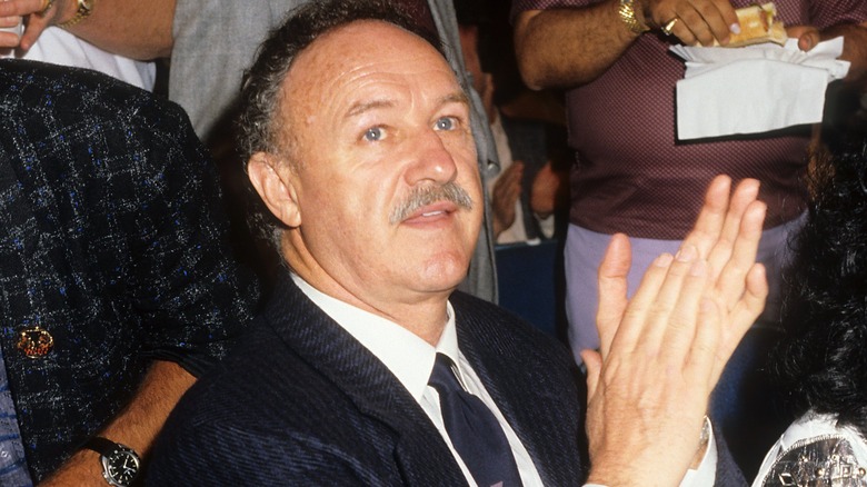 Gene Hackman clapping