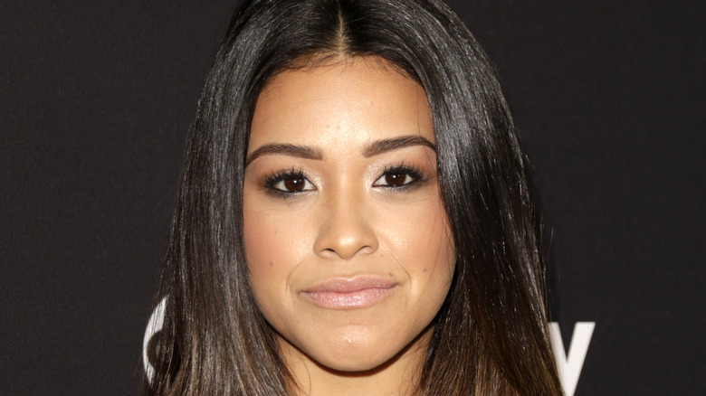 Gina Rodriguez looking serious