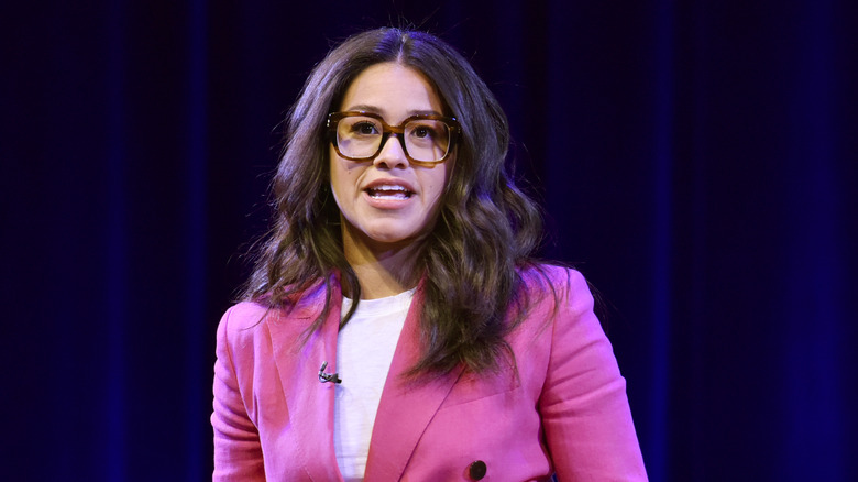 Gina Rodriguez wearing glasses