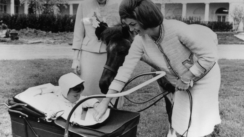 Jackie Kennedy with baby carriage