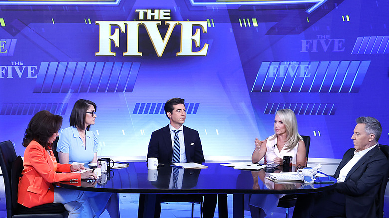 The hosts of The Five at a table