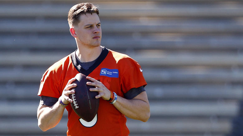 Joe Burrow holding a football 