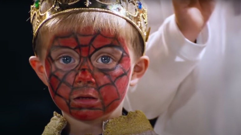 Kid in Spider-Man makeup in Love Actually