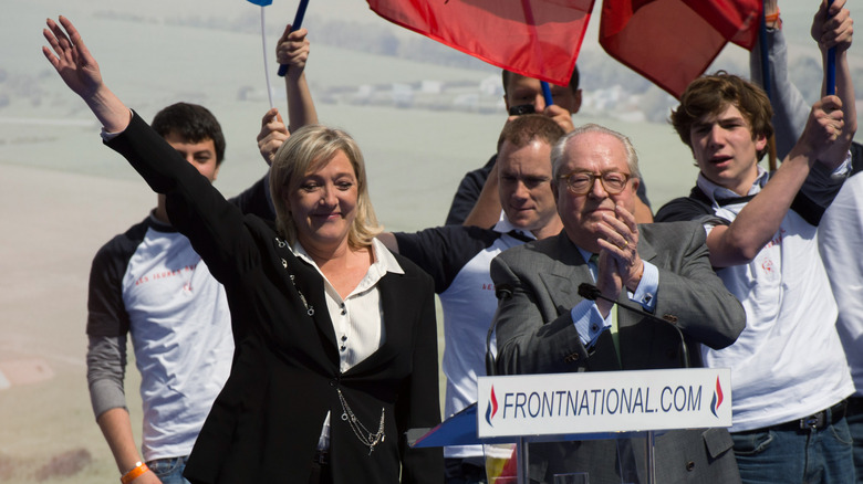 Marine Le Pen and her father Jean-Marie smiling