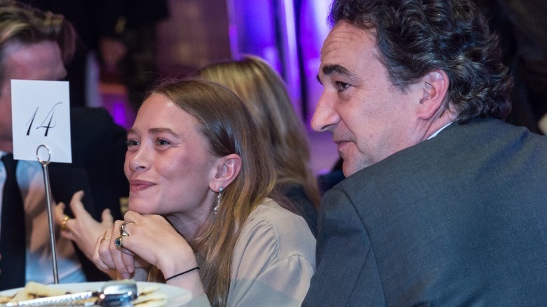 Mary-Kate Olsen and Olivier Sarkozy smiling