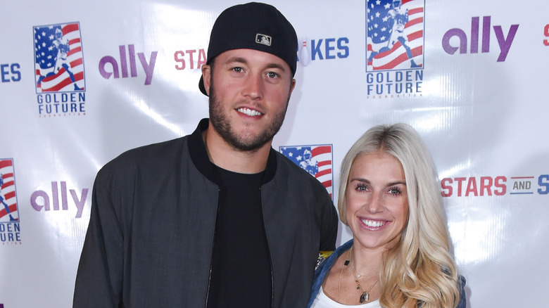 Kelly and Matthew Stafford smiling 