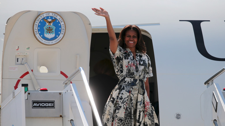 Michelle Obama waving from plane