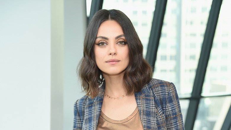 Mila Kunis in a blazer