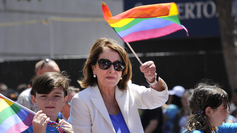 Nancy Pelosi waving flag