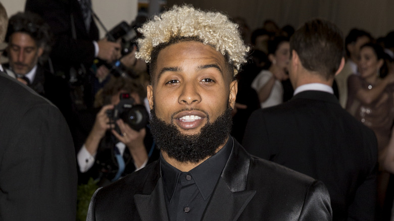 Odell Beckham Jr. wearing black suit