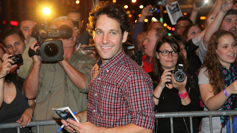 Paul Rudd by cameras and people