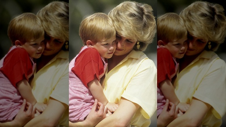 Princess Diana holding young Harry