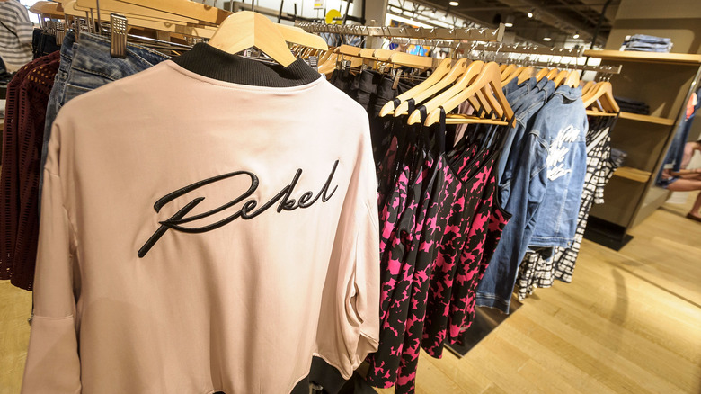 Rebel Wilson clothing on hangers