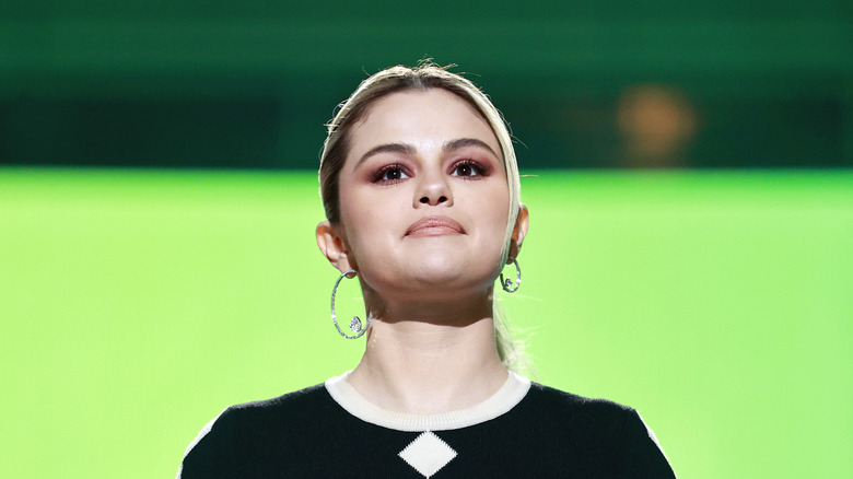 Selena Gomez smiling with her chin up