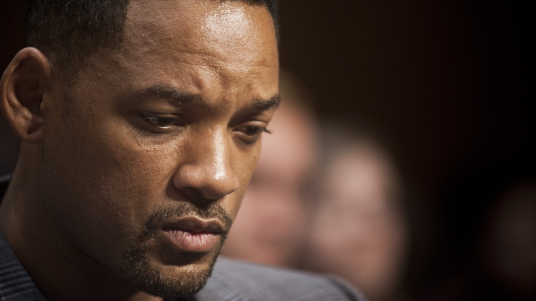 Will Smith looking somber