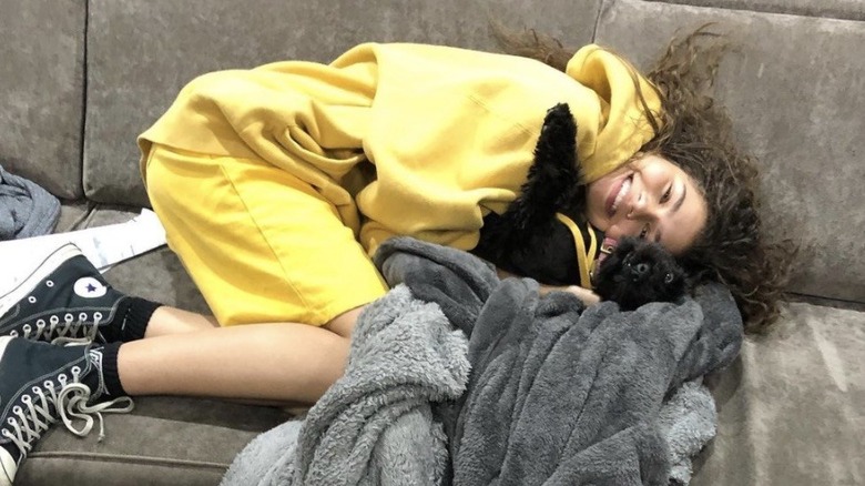 Zendaya relaxing with her dog