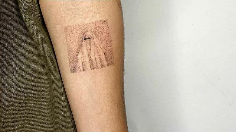 Dotwork square ghost tattoo in black & white