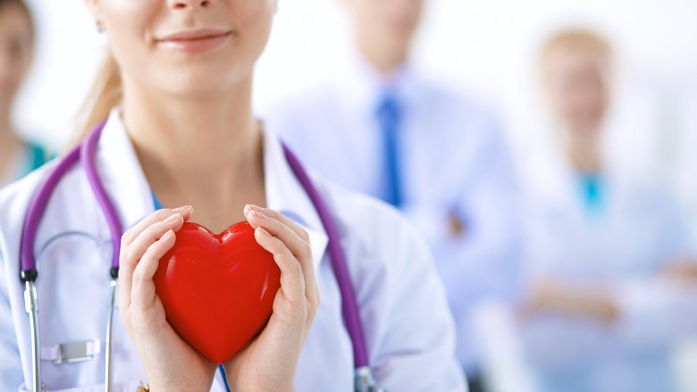 doctor holding a heart