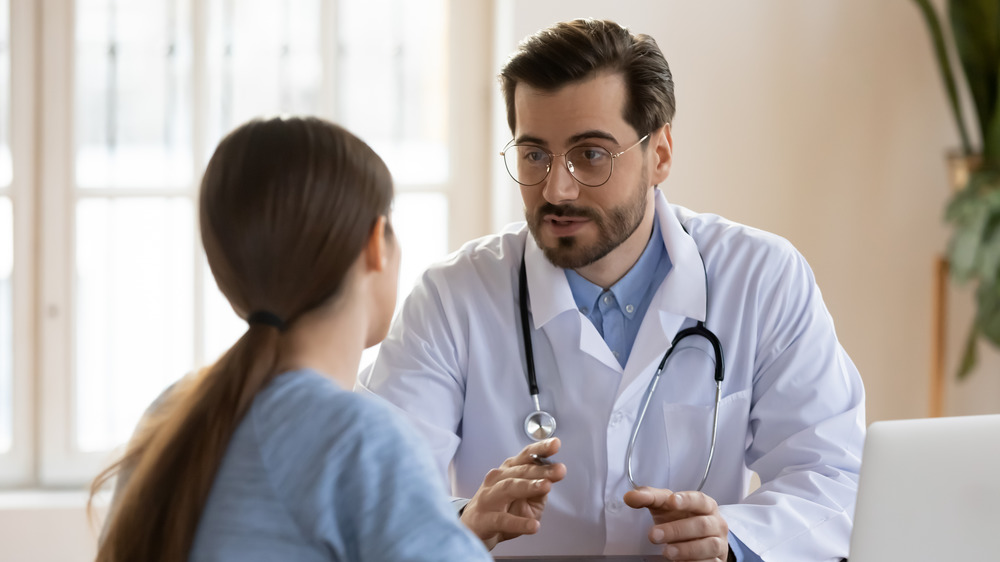 Doctor with young patient