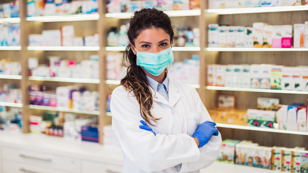 Pharmacist standing at a pharmacy