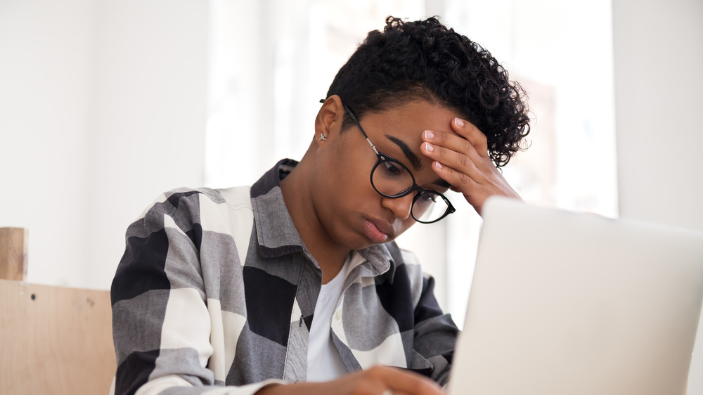 Woman having difficulty concentrating