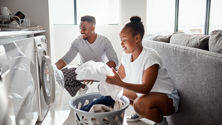 couple doing laundry together