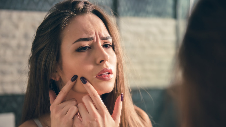 woman with acne