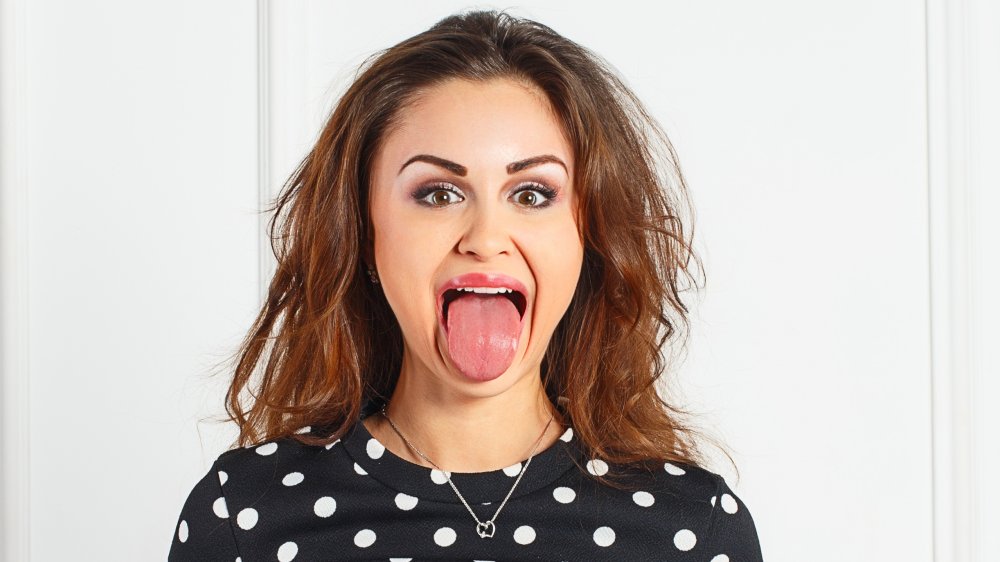 woman sticking out tongue