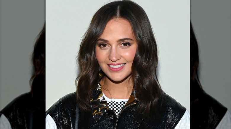 Alicia Vikander at a Louis Vuitton runway show