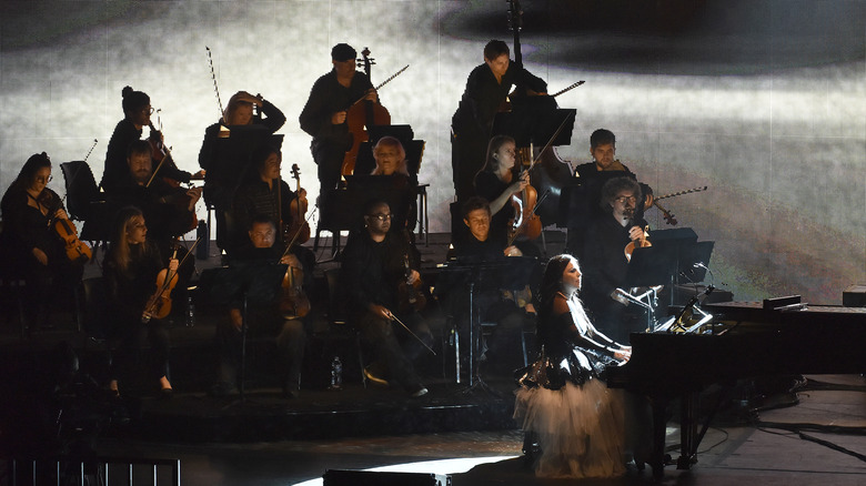 Amy Lee with orchestra with Evanescence on the Synthesis tour