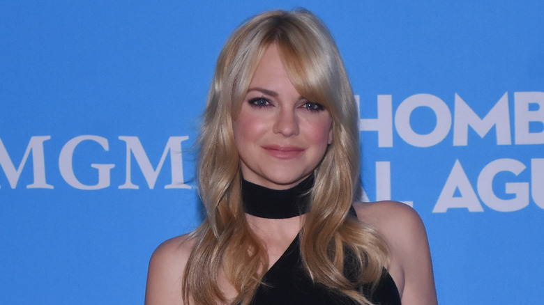 Anna Faris smiling at a press conference at the St. Regis Hotel