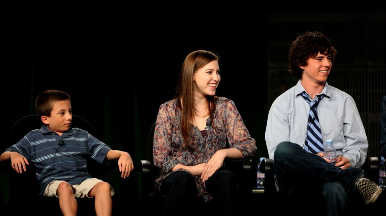 Atticus Shaffer, Eden Sher, and Charlie McDermott talking on panel