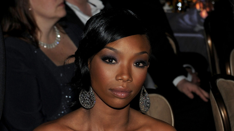 Brandy looking serious at event