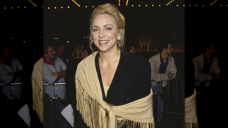 brett butler smiling wearing shawl