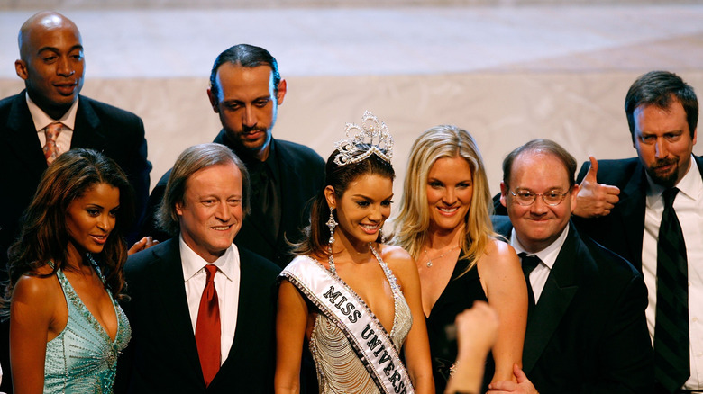 Bridgette Wilson-Sampras smiling with Miss Teen USA winner