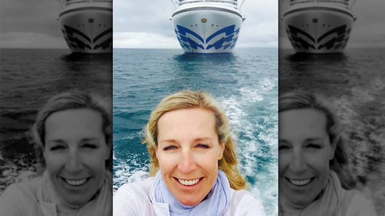 Selfie of Candice Olson in front of cruise ship