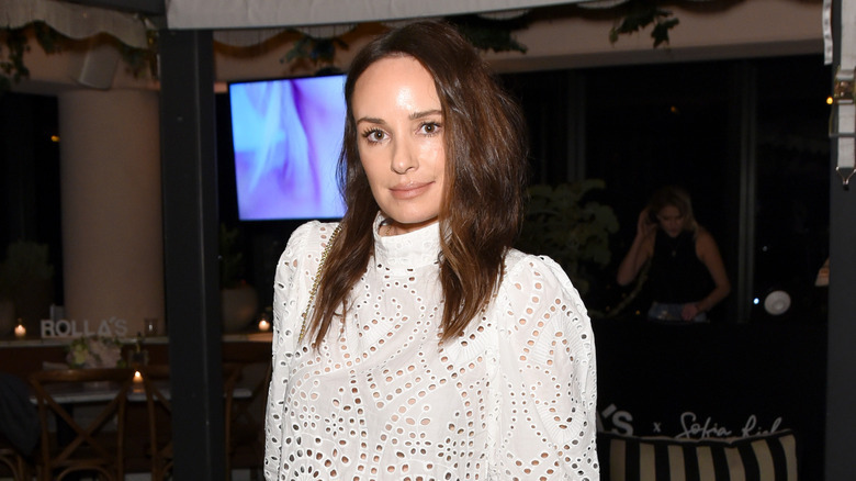 Catt Sadler in a white top