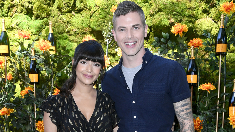 Hannah Simone and Jesse Giddings smiling