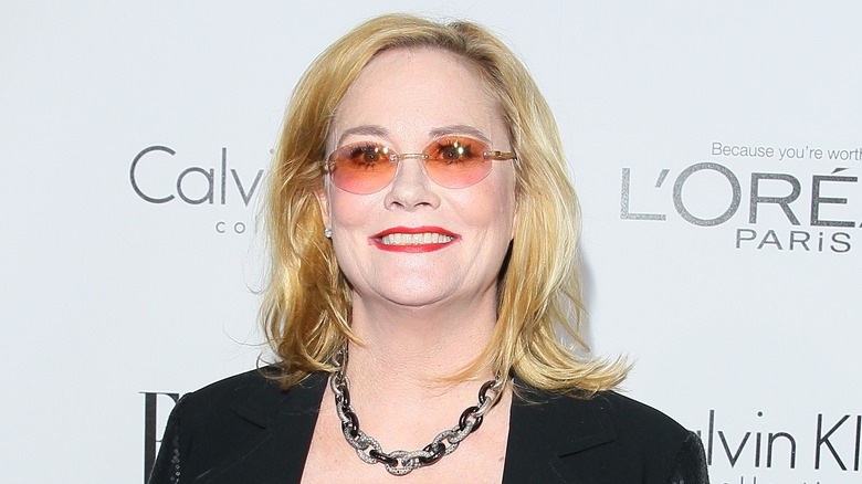 Cybill Shepherd smiling in glasses