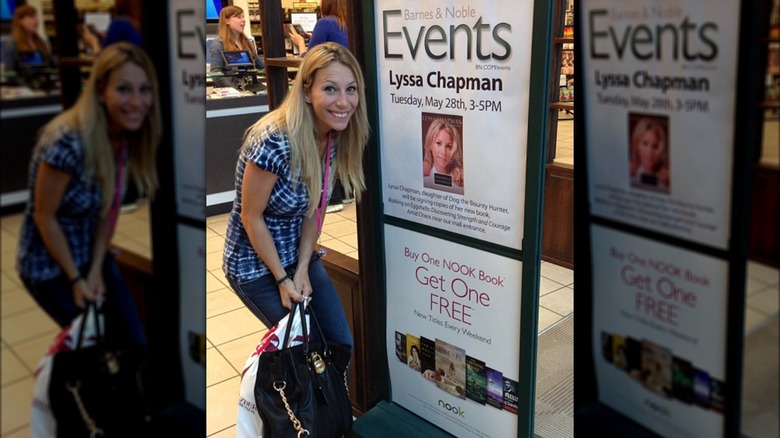 Lyssa Chapman posing with her book photo