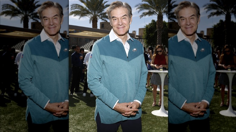 Dr. Oz green jacket outdoors palm trees