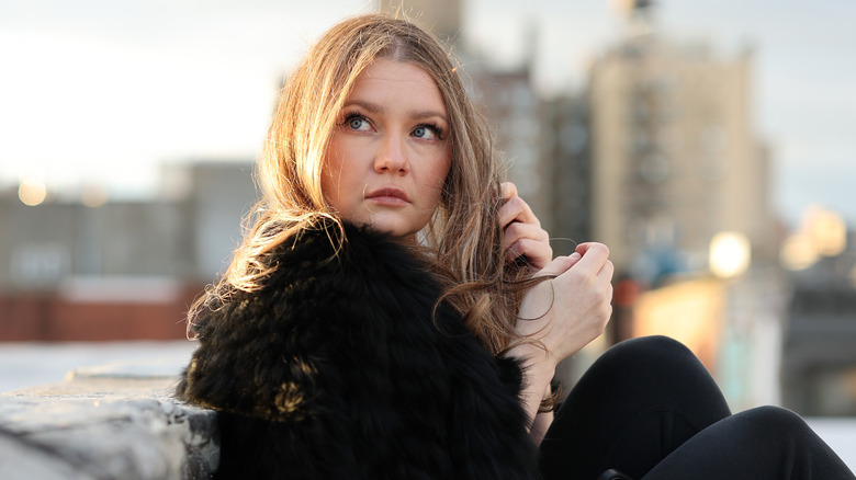 Anna Delvey posing outside