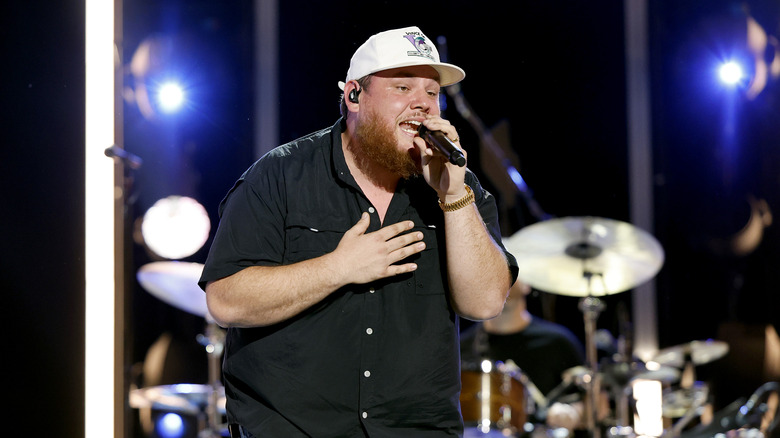 Luke Combs performs onstage 