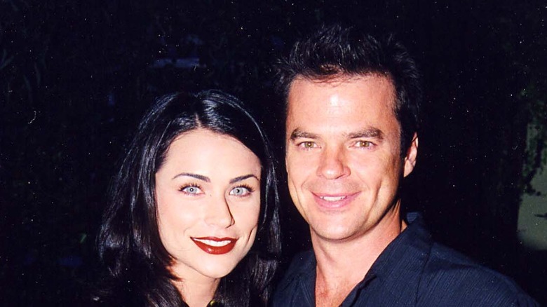 Rena Sofer and Wally Kurth smiling