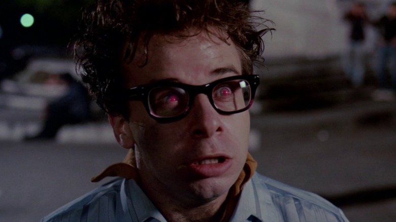 Rick Moranis with his eyes glowing red as Louis Tully in Ghostbusters