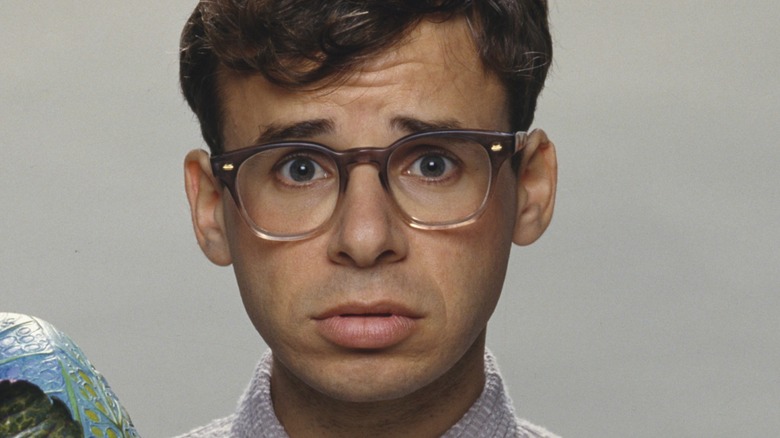 Rick Moranis as Seymour from Little Shop of Horrors, looking sad and scared