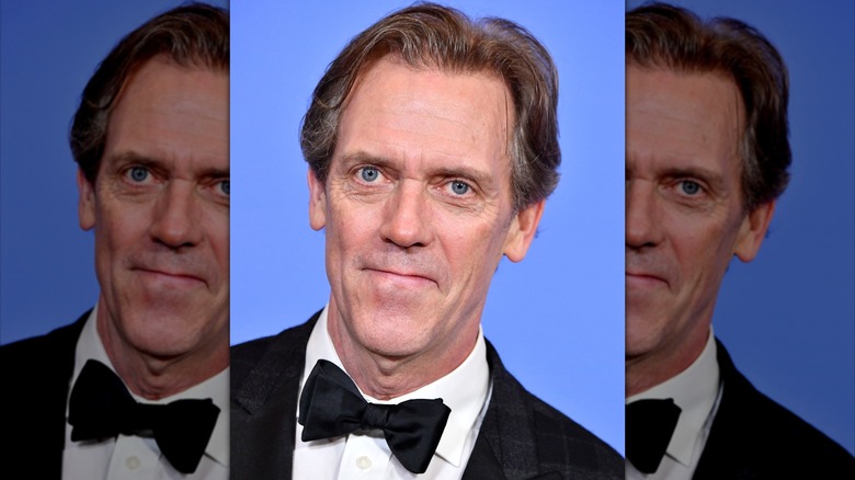 Hugh Laurie smiling at the 74th Annual Golden Globe Awards in Beverly Hills, 2017.