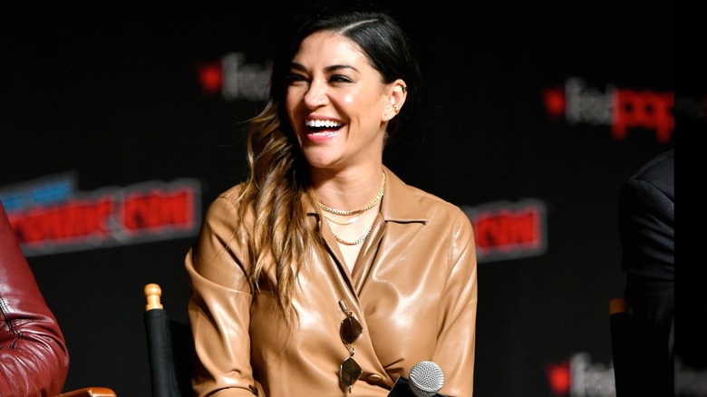 Jessica Szohr laughing on stage