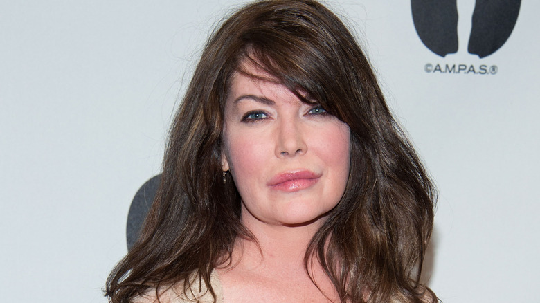 Lara Flynn Boyle smirking