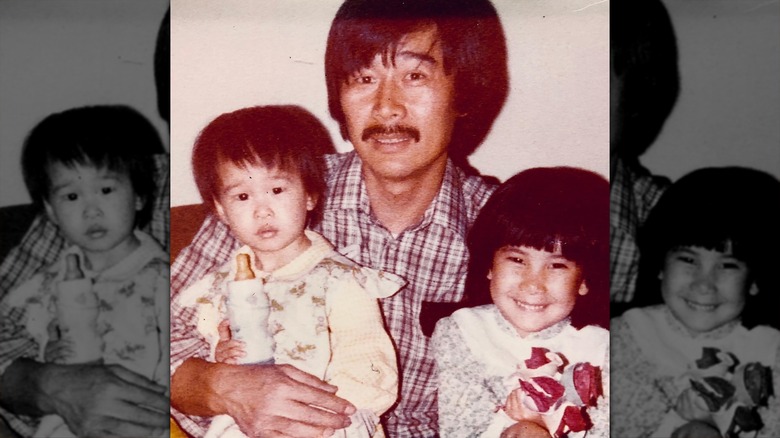 Lisa Ling as a child with her father and sister